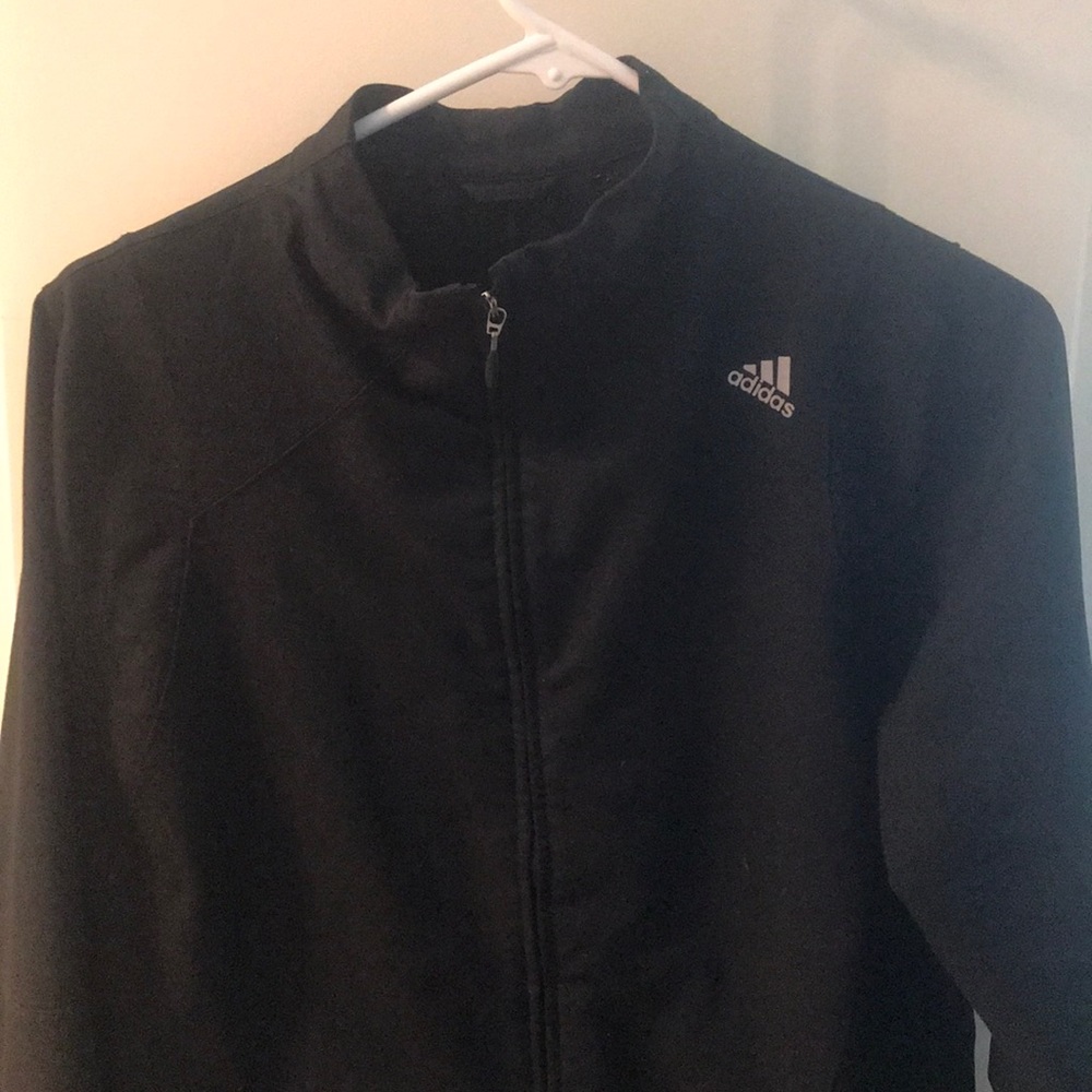 Black Adidas jacket.